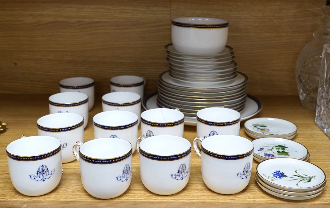 A Royal Worcester blue and gilt crested part tea set together with a set of seven floral Rosenthal miniature porcelain dishes, largest 22cm in diameter. Condition - varies, mostly fair